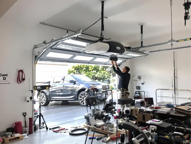 Torrance Garage Door Repair specialist installing smart garage door opener system in Torrance home