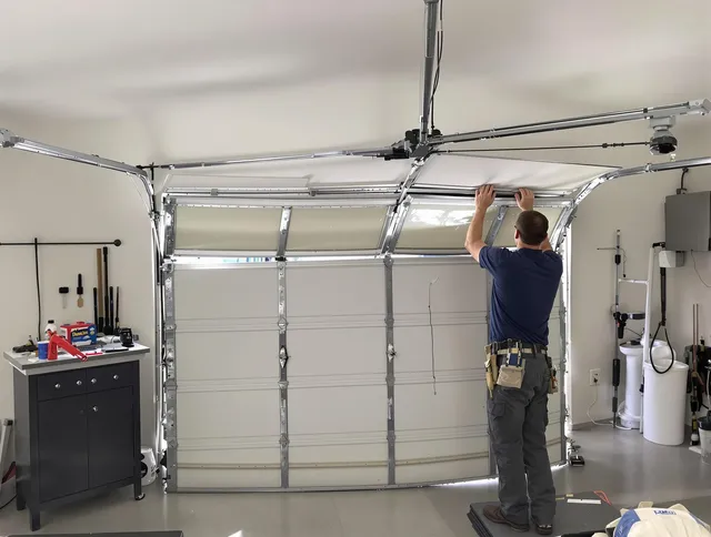 Torrance Garage Door Repair specialist performing precise section replacement on Torrance garage door