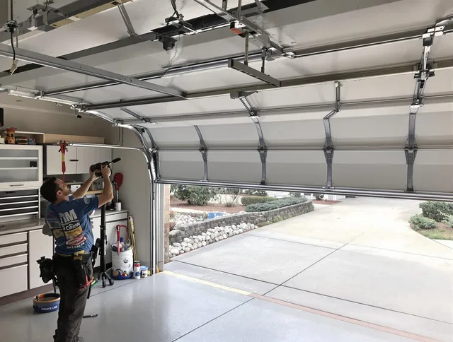 Garage door track repair service by Torrance Garage Door Repair in Torrance